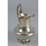 AN EARLY VICTORIAN SILVER CREAM JUG, of baluster form, cast 'S' scroll handle, engraved initials
