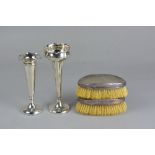 A PAIR OF GEORGE V OVAL SILVER BACKED DRESSING TABLE BRUSHES, engine turned, makers Charles S. Green