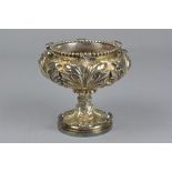 A GEORGE IV SILVER GILT CIRCULAR PEDESTAL SAUCE TUREEN BY ROBERT HENNELL II, beaded rim above cast