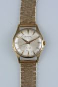 A 9CT GOLD MID 20TH CENTURY GENTS ROTARY WRISTWATCH, round case measuring approximately 33mm in