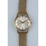 A 9CT GOLD MID 20TH CENTURY GENTS ROTARY WRISTWATCH, round case measuring approximately 33mm in