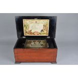 A LATE 19TH CENTURY SWISS TABLE TOP MUSIC BOX, the 15.3cm/6 inch cylinder playing eight airs on