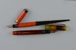 A 1930'S PARKER DUOFOLD JUNIOR FOUNTAIN PEN, translucent orange barrel with a translucent green