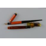 A 1930'S PARKER DUOFOLD JUNIOR FOUNTAIN PEN, translucent orange barrel with a translucent green