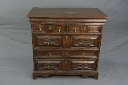 AN EARLY 18TH CENTURY AND LATER OAK CHEST OF DRAWERS, replacement top over two short and three