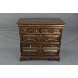 AN EARLY 18TH CENTURY AND LATER OAK CHEST OF DRAWERS, replacement top over two short and three