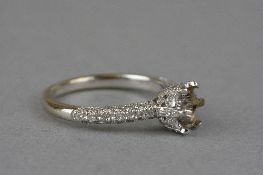 A MODERN DIAMOND RING MOUNT, fancy pave set design, diamonds set to shoulders, sides and under