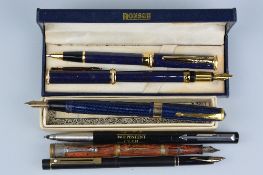A BOXED CONWAY STEWART 27 FOUNTAIN PEN, in machined blue and gold finish, a Sheaffer slimline
