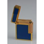 A DUPONT GOLD PLATED AND BLUE ENAMEL LIGHTER, in manufacturers fitted case