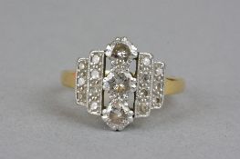 A LATE 20TH CENTURY DIAMOND DRESS RING, centring on three modern round brilliant cut diamonds,