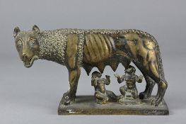 A 19TH CENTURY BRONZE OF THE CAPITOLINE WOLF WITH ROMULUS AND REMUS SUCKLING, on a rectangular base,