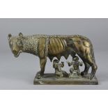 A 19TH CENTURY BRONZE OF THE CAPITOLINE WOLF WITH ROMULUS AND REMUS SUCKLING, on a rectangular base,