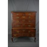 A GEORGE III OAK CHEST ON STAND, moulded cornice above two short and three long drawers, the stand