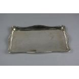 A GEORGE VI RECTANGULAR SILVER DRESSING TABLE TRAY, wavy rim, makers BBS, Birmingham 1945,