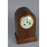 AN EARLY 20TH CENTURY MAHOGANY CASED MANTEL CLOCK, dome top, French movement, enamel dial painted