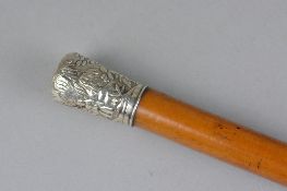 A 19TH CENTURY MALACCA WALKING CANE, Chinese white metal, handle chased with figures in a landscape,