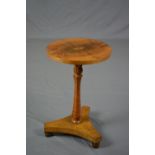 AN EARLY VICTORIAN OCCASIONAL TABLE, the circular top with quarter veneered walnut with central oval