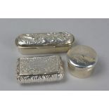 A VICTORIAN RECTANGULAR SILVER SNUFF BOX, floral engraved cover and base, the top with cartouche and
