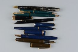A COLLECTION OF PARKER FOUNTAIN PENS AND A PEN SET, these include a Maxima in a blue and gold, a