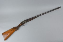 A 12 BORE 2 1/2'' CHAMBERED DAMASCUS BARRELLED SIDE BY SIDE HAMMER NON EJECTOR SHOTGUN, fitted