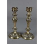 A PAIR OF ELIZABETH II VICTORIAN STYLE SILVER CANDLESTICKS, of circular form with cast rims and