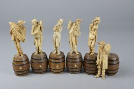 A SET OF SIX 19TH CENTURY FRENCH IVORY FIGURES MOULDED AS MUSICIANS, standing atop stained wooden