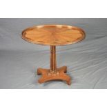 A 19TH CENTURY OVAL SATINWOOD, ROSEWOOD INLAID AND BANDED TILT TOP TABLE, the galleried top with