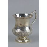 A WILLIAM IV IRISH SILVER TANKARD, of baluster form, cast 'S' scroll handle, the lower body repousse