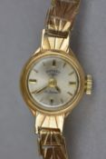 A MID 20TH CENTURY LADIES 9CT GOLD ROTARY WRISTWATCH, case measuring approximately 15mm in diameter,
