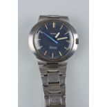 AN OMEGA GENEVE DYNAMIC GENTS WRISTWATCH, with oval steel case, blue dial, silver baton markers,