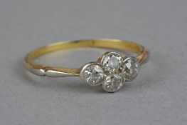 AN EARLY 20TH CENTURY FOUR STONE DIAMOND DRESS RING, four old Swiss and old European cut diamonds,
