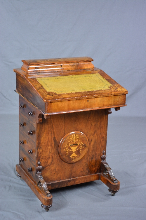 A VICTORIAN BURR WALNUT AND INLAID DAVENPORT, fitted with covered recess to the top, replacement