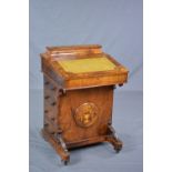 A VICTORIAN BURR WALNUT AND INLAID DAVENPORT, fitted with covered recess to the top, replacement