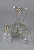 A LATE VICTORIAN CUT GLASS CLARET JUG, of shaft and globe form, plated mounts, rope twist effect