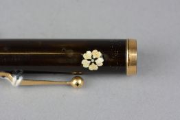 DUNHILL NAMIKI LACQUER FOUNTAIN PEN, decorated with mother of pearl flowers and gold flecks, the nib