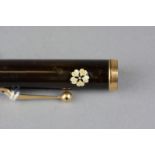 DUNHILL NAMIKI LACQUER FOUNTAIN PEN, decorated with mother of pearl flowers and gold flecks, the nib