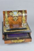 A VICTORIAN BURR WALNUT AND EBONISED BRASS BOUND DESK STAND STATIONARY CABINET, the domed hinged top