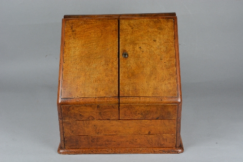 A LATE VICTORIAN WALNUT AND OAK STATIONARY BOX, bearing label for 'Army & Navy C.S.L. Makers',