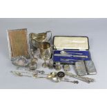 A PARCEL OF SILVER, to include a George V rectangular silver easel back photograph frame, makers