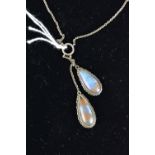 A SILVER BUTTERFLY WING NECKLACE