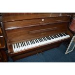 A ZENDER MAHOGANY UPRIGHT PIANO