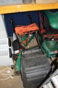 A BLACK AND DECKER ELECTRIC LAWN MOWER, with grass box and two electric strimmers (3)