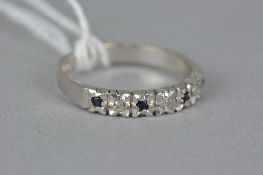 A LATE 20TH CENTURY 9CT WHITE GOLD SAPPHIRE AND DIAMOND HALF ETERNITY RING, ring size N1/2,