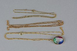 A MODERN OVAL MULTI COLOURED GLASS PENDANT, together with three fine chains in various length, all