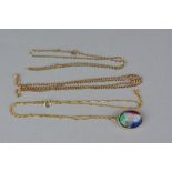 A MODERN OVAL MULTI COLOURED GLASS PENDANT, together with three fine chains in various length, all