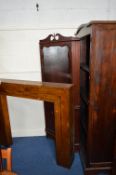 A HARDWOOD BOOKCASE, fire surround and a mahogany glazed corner cupboard (3)