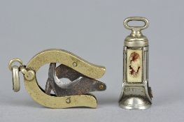 AN CIGAR CUTTER, decorated with head of an animal and another (2)