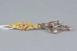 A 9CT EDWARDIAN BROOCH, together with a silver brooch (2)