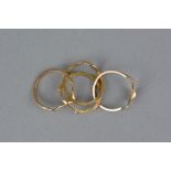 A LATE 20TH CENTURY PUZZLE RING, four bands, ring size approximately J, approximate gross weight 4.7