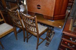 AN OAK REFECTORY TABLE, and four spindle back chairs (5)